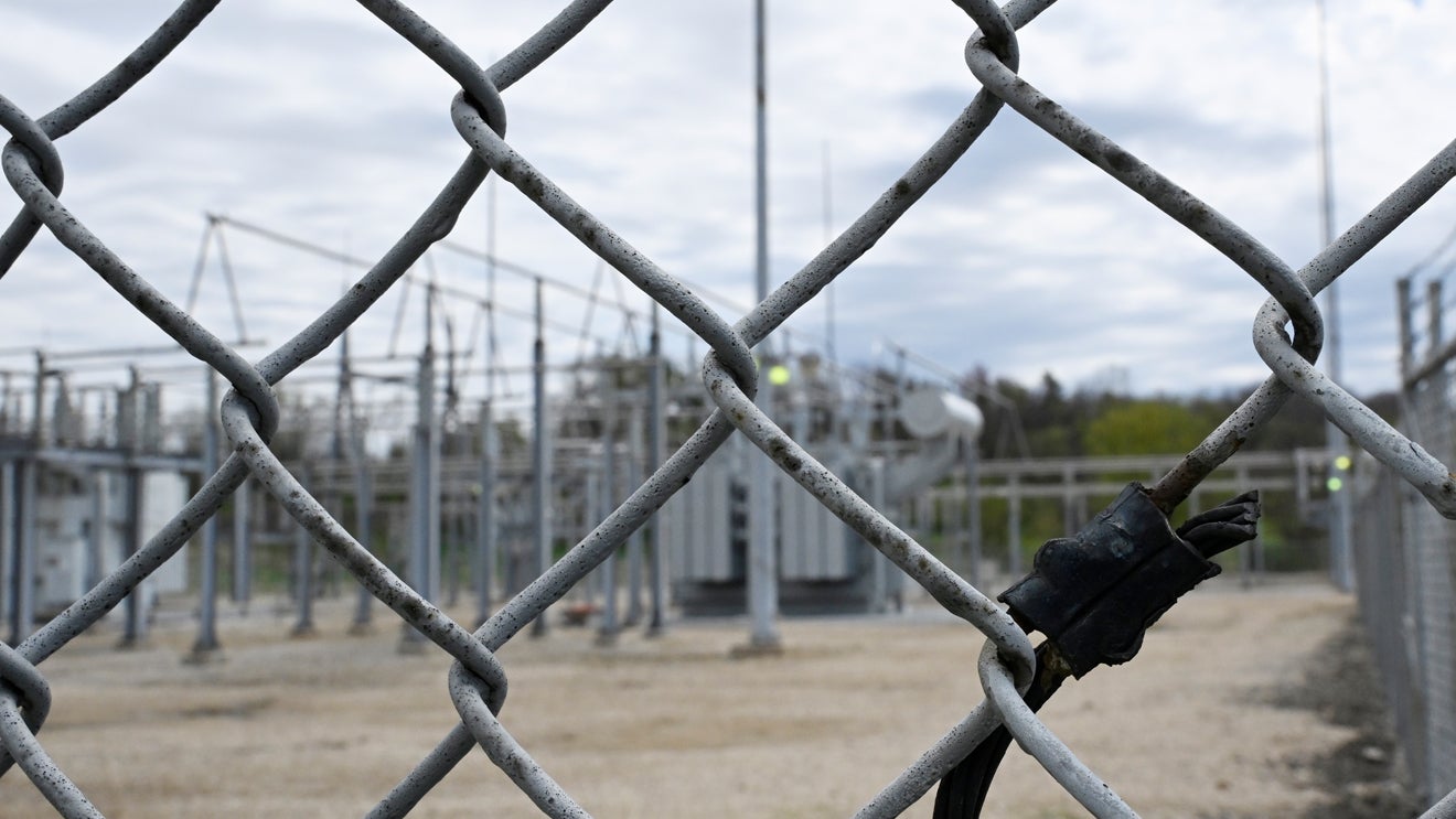 Substation image behind fence