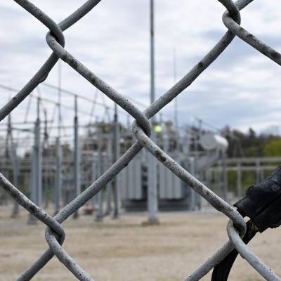 Substation image behind fence